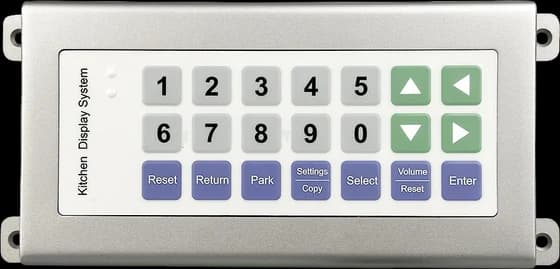 Silver wall-mounted wireless kitchen bump bar with a numeric keypad and park, select and enter keys